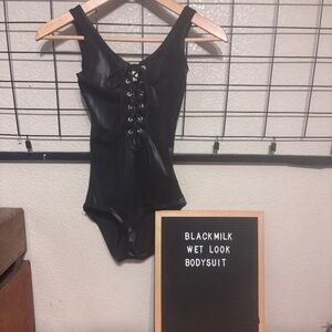 NWOT Blackmilk Wet Look Lace Up Bodysuit small